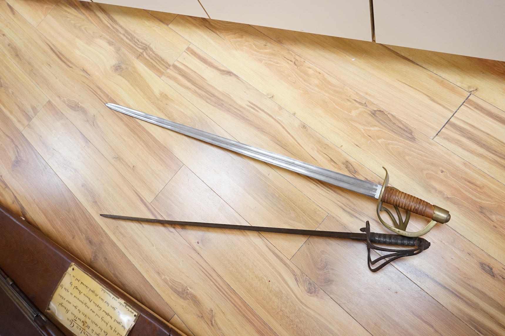 A Victorian Royal Artillery officer’s sword in poor condition and a copy of a French 1813 Cuirassier’s sword (2)